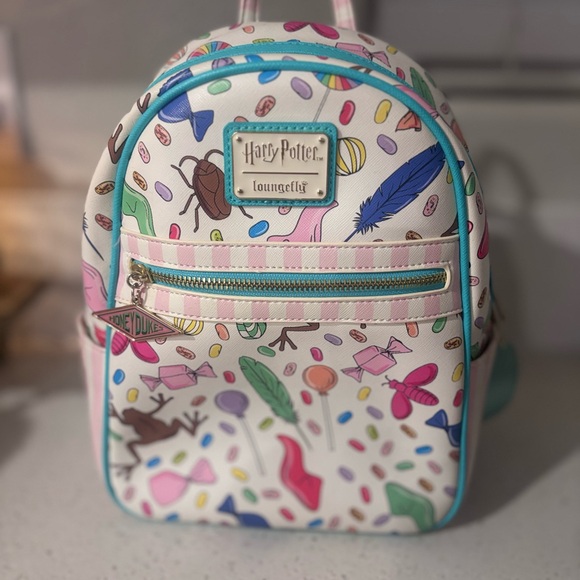 Loungefly Handbags - Loungefly White Honeydukes Candy Print Kids Mini Backpack